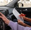 woman taking her drivers license test vehicle