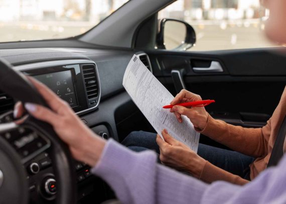 woman taking her drivers license test vehicle